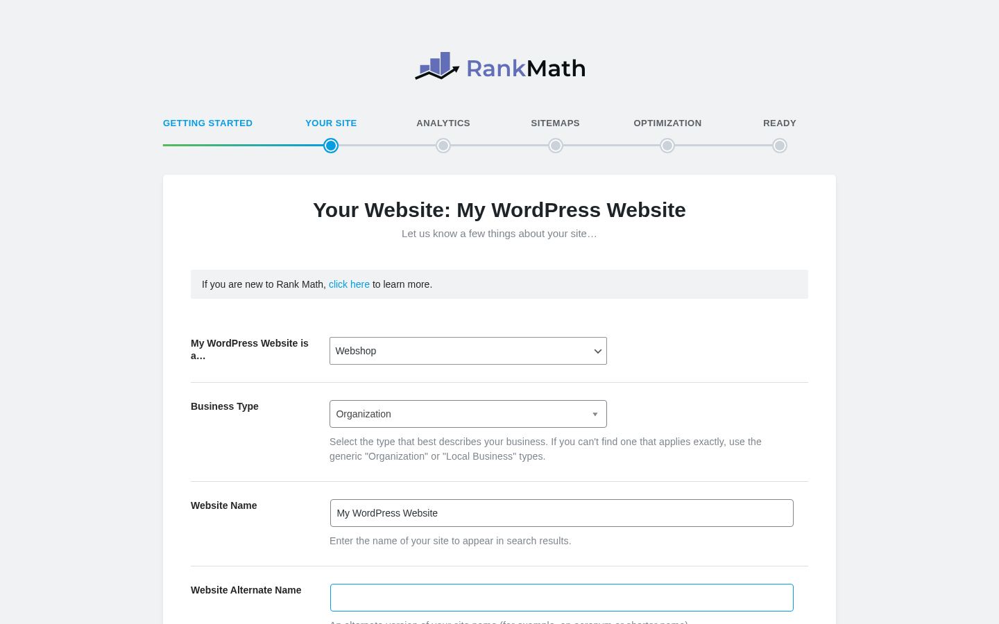 Rank Math setup wizard Your Site step captured from the sandbox, showing the Getting Started / Your Site progress steps with green-check completion markers, the heading Your Website: My WordPress Website and the Let us know a few things about your site subhead, the site type selector set to Webshop, the Business Type dropdown set to Organization, the Website Name field, and the Website Alternate Name field highlighted in blue.