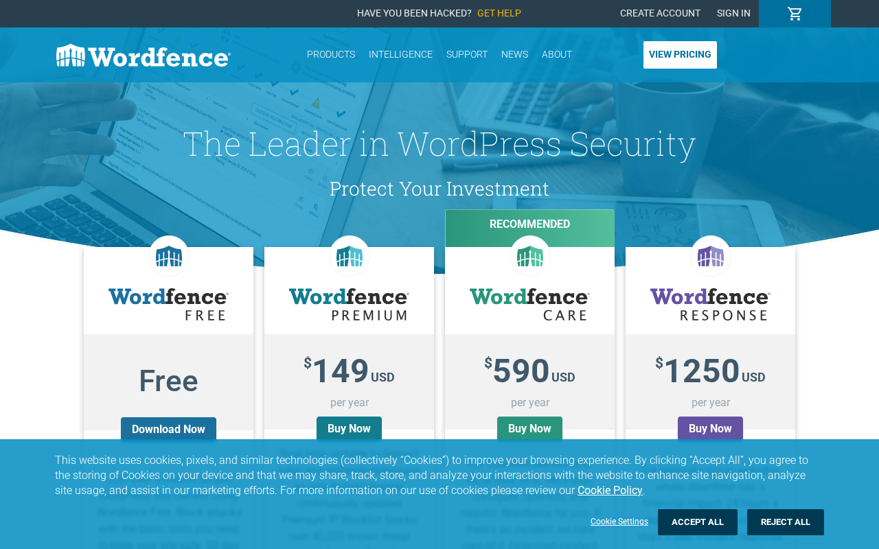 Wordfence pricing page showing four plan tiles: Wordfence Free at $0, Wordfence Premium at $149 USD per year, Wordfence Care at $590 USD per year labeled RECOMMENDED, and Wordfence Response at $1,250 USD per year. Each tile has a Download Now or Buy Now button